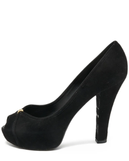 Elegant black suede shoes featuring refined gold-tone detailing and a cushioned branded insole for a sophisticated and comfortable finish.